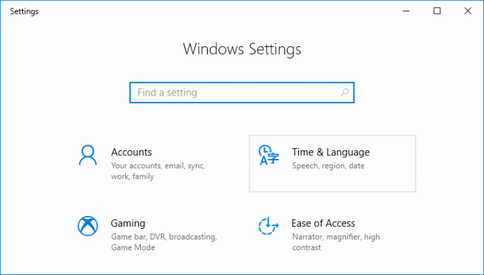 Stlačením klávesu Windows + I otvorte Nastavenia a potom kliknite na Čas a jazyk