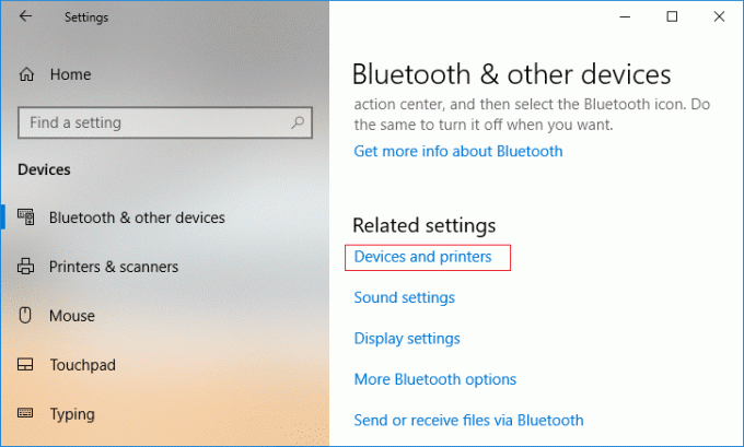 Seleccione Bluetooth y otros dispositivos y luego haga clic en Dispositivo e impresoras en Configuración relacionada
