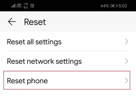 dodirnite opciju Reset phone u Reset System Settings