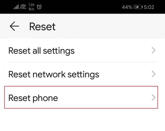 toque en la opción Restablecer teléfono en Restablecer configuración del sistema