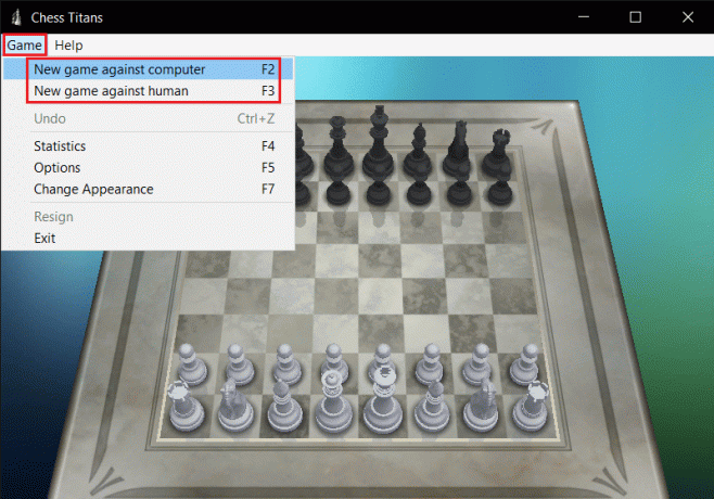 حدد لعبة جديدة ضد الكمبيوتر أو الإنسان في القائمة المنسدلة للعبة Chess Titans
