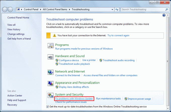 Skiltyje Sistema ir sauga spustelėkite Ištaisyti problemas naudojant „Windows Update“.