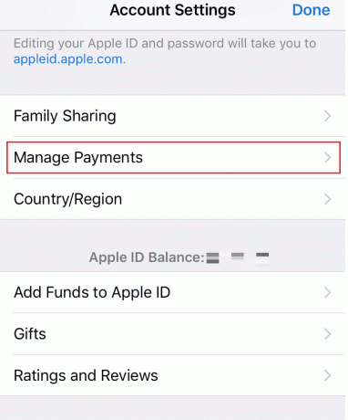 iPhone - Trykk på Administrer betalinger og bekreft brukeridentitet med Touch ID eller Face ID