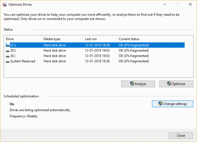 Haga clic en Cambiar configuración en Optimización programada